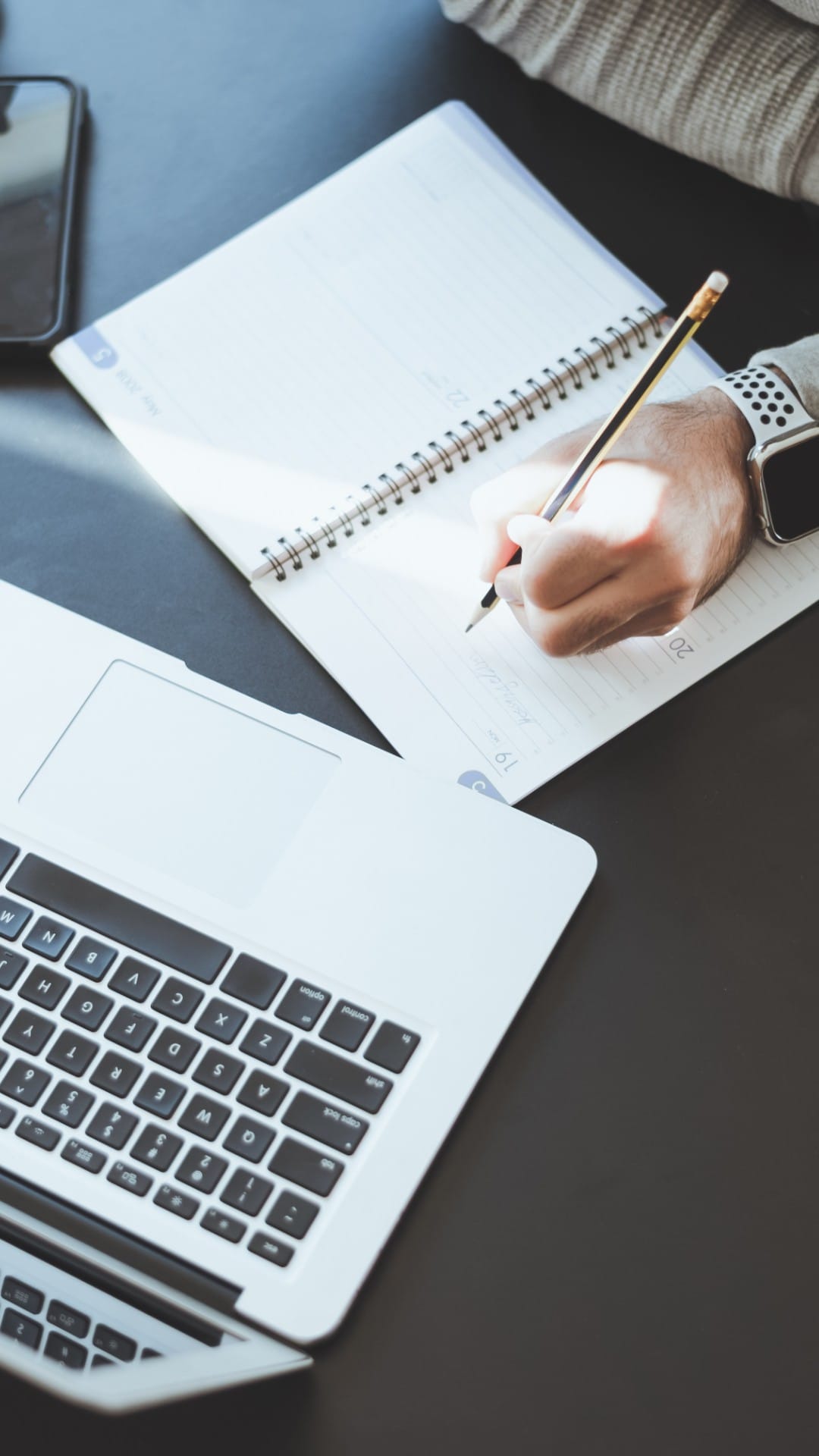 Planning Pinterest audience strategy at a desk
